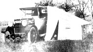 Tent mounted on side of car