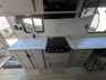 Image 14 of 21 - coachmen clipper 242MK sink and stove