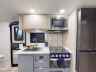 Image 19 of 27 - 2025 primetime tracer RV190rb trailer kitchen